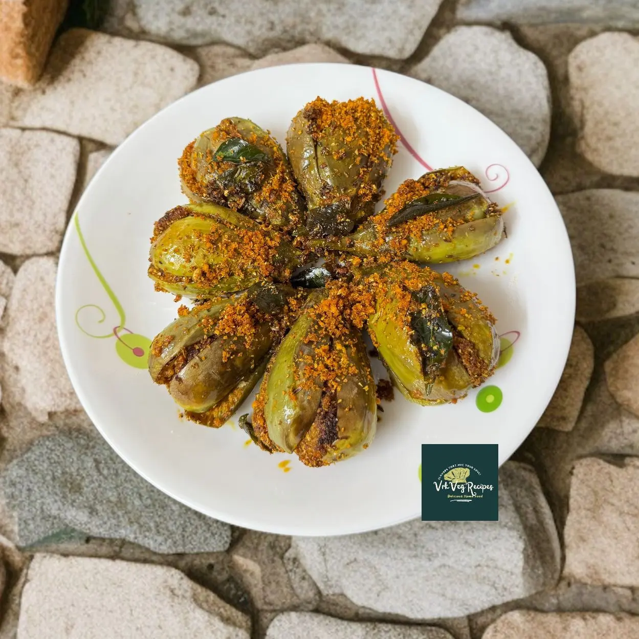 South Indian Style Spicy Brinjal Curry South Indian-style dry masala stuffed brinjals slowly cooked to perfection, rich in flavor and best with steamed rice.