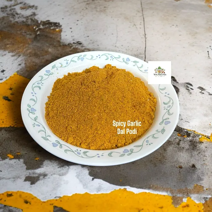 Authentic Spicy Garlic Dal Podi Recipe - South Indian Spice A flavorful South Indian spice mix, Spicy Garlic Dal Podi combines smoky red chilies, roasted dal, and garlic, ideal for enhancing your meals.