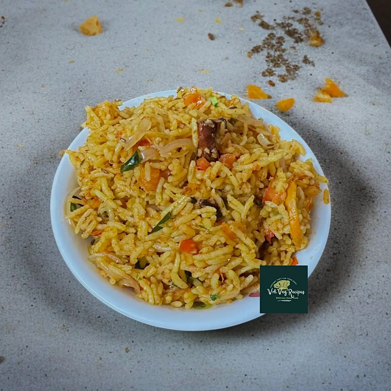 Spicy Tomato Rice with Indian Whole Spices A bowl of spicy tomato rice cooked with whole Indian spices, garnished with coriander and served hot for a comforting meal.