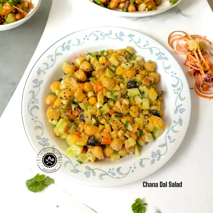 Indian Style Chana Salad Recipe Healthy Indian chana salad made with boiled chickpeas, onions, tomatoes, cucumber, and zesty lemon juice.