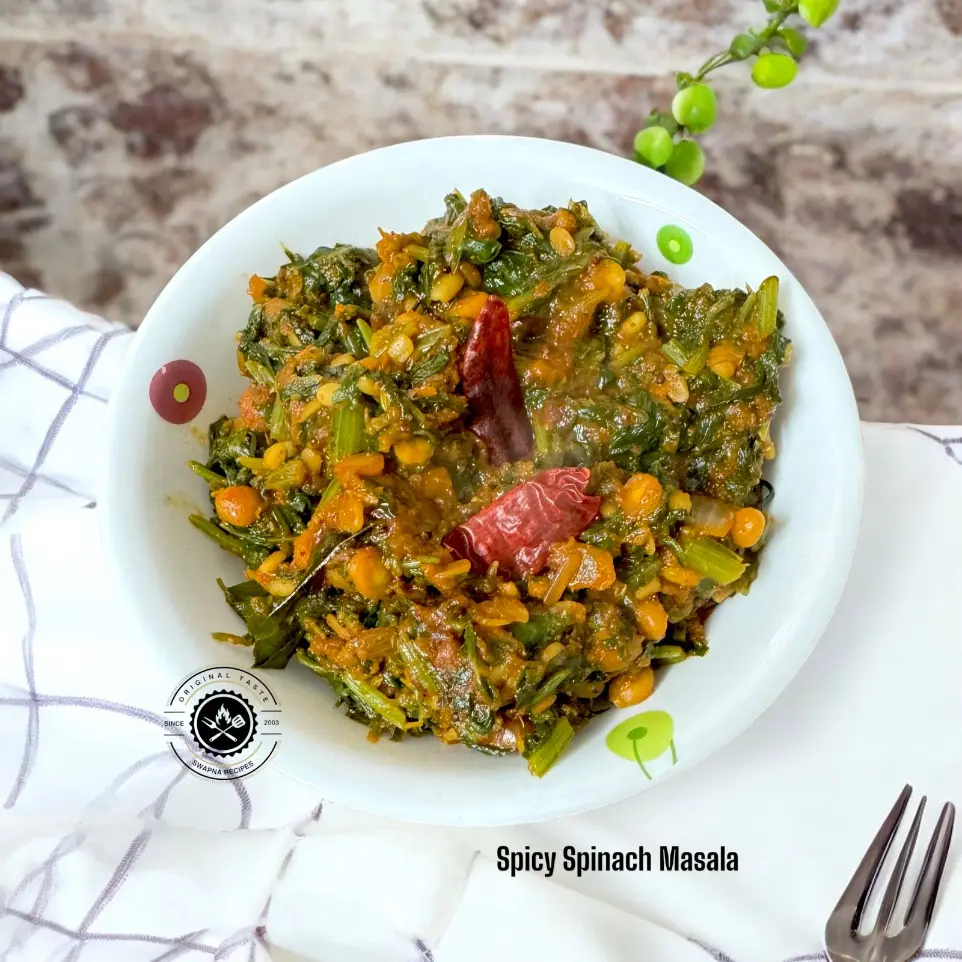 Spicy Spinach Curry Without Tomato or Garlic Aromatic spicy spinach curry with onions and Indian spices, served hot with roti or rice, without tomato or garlic.