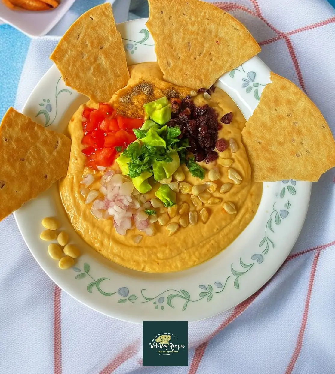 Protein-Rich Yogurt Dip for Khakra Snack High-protein yogurt-based dip made with boiled chana, avocado, and spices, garnished for a colorful presentation