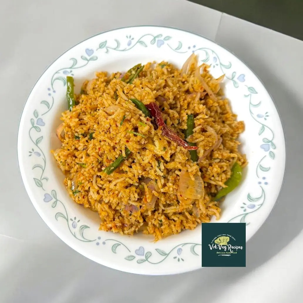 Aromatic garlic pepper masala rice with toasted dals, curry leaves, and spicy butter tempering served hot with raita.