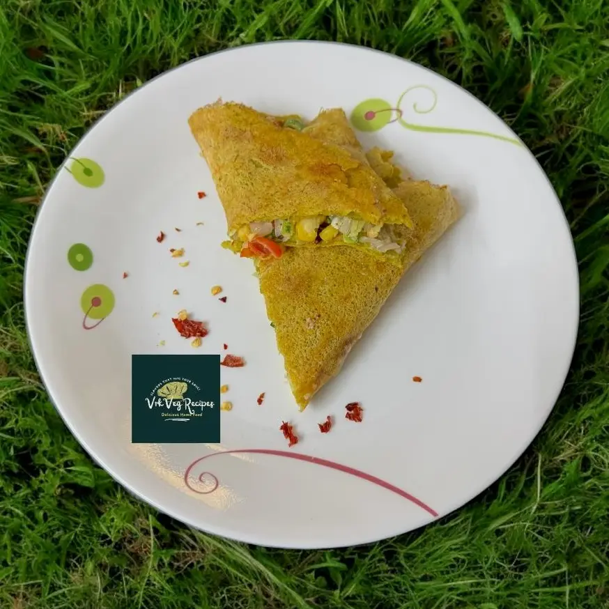 Healthy Lentil Dosa Wraps with Veg-Paneer Mix Gluten-free red lentil wraps stuffed with spiced zucchini, sweet corn, cherry tomatoes, and paneer filling.