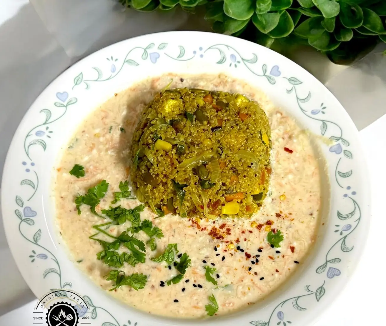 Healthy red wheat rava paneer biryani cooked with vegetables, spices, and pumpkin seeds for a balanced, nutritious meal.