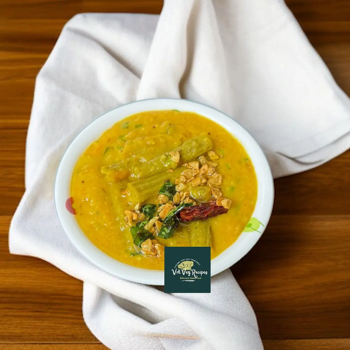 Flavor-Packed Toor Dal with Drumstick & Tadka Spicy garlic tadka over creamy toor dal with tender drumsticks—flavorful, aromatic, and perfect for a soulful meal.