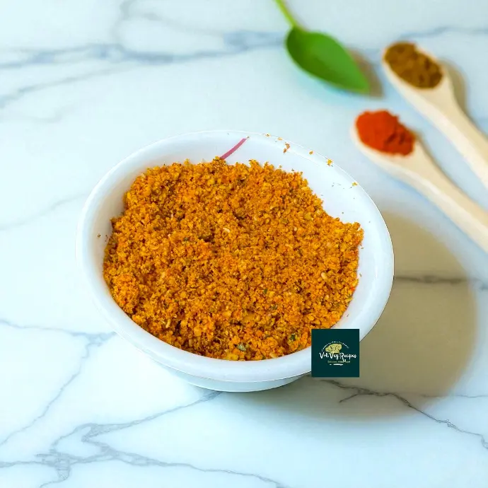Spicy Curry Mix with Garlic and Peanuts Spicy and flavorful South Indian masala powder with peanuts, garlic, sesame, and tamarind for authentic taste.